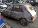 mangueta delantera izquierda peugeot 205 Foto 4